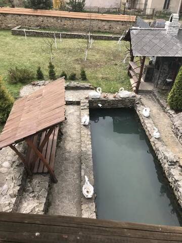 Фото номера Дом с 1 спальней Дома для отпуска Wooden House г. Межгорье 21